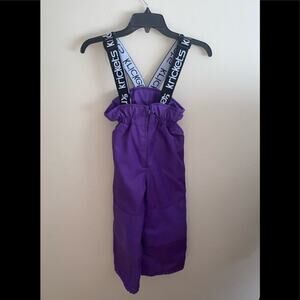 KRICKETS GIRLS SQUALL BIBS SIZE 4